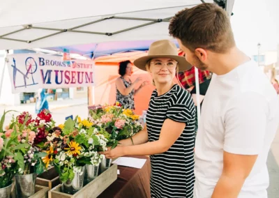 Young Couple Buying Flowers at Farmer's Market in Red Deer